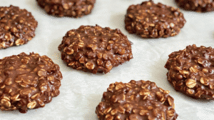 Classic No Bake Cookie Recipes with oats, chocolate, and peanut butter on parchment paper