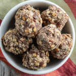 Easy chocolate marshmallow no-bake cookies in bowl with chocolate chips and coconut - simple dessert recipe photo