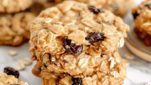classic no bake cookies with raisins made from oats, sugar, butter, and cocoa powder.