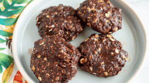 Easy No Bake Chocolate Fudge Cookies made with cocoa, oats, and peanut butter on a white plate