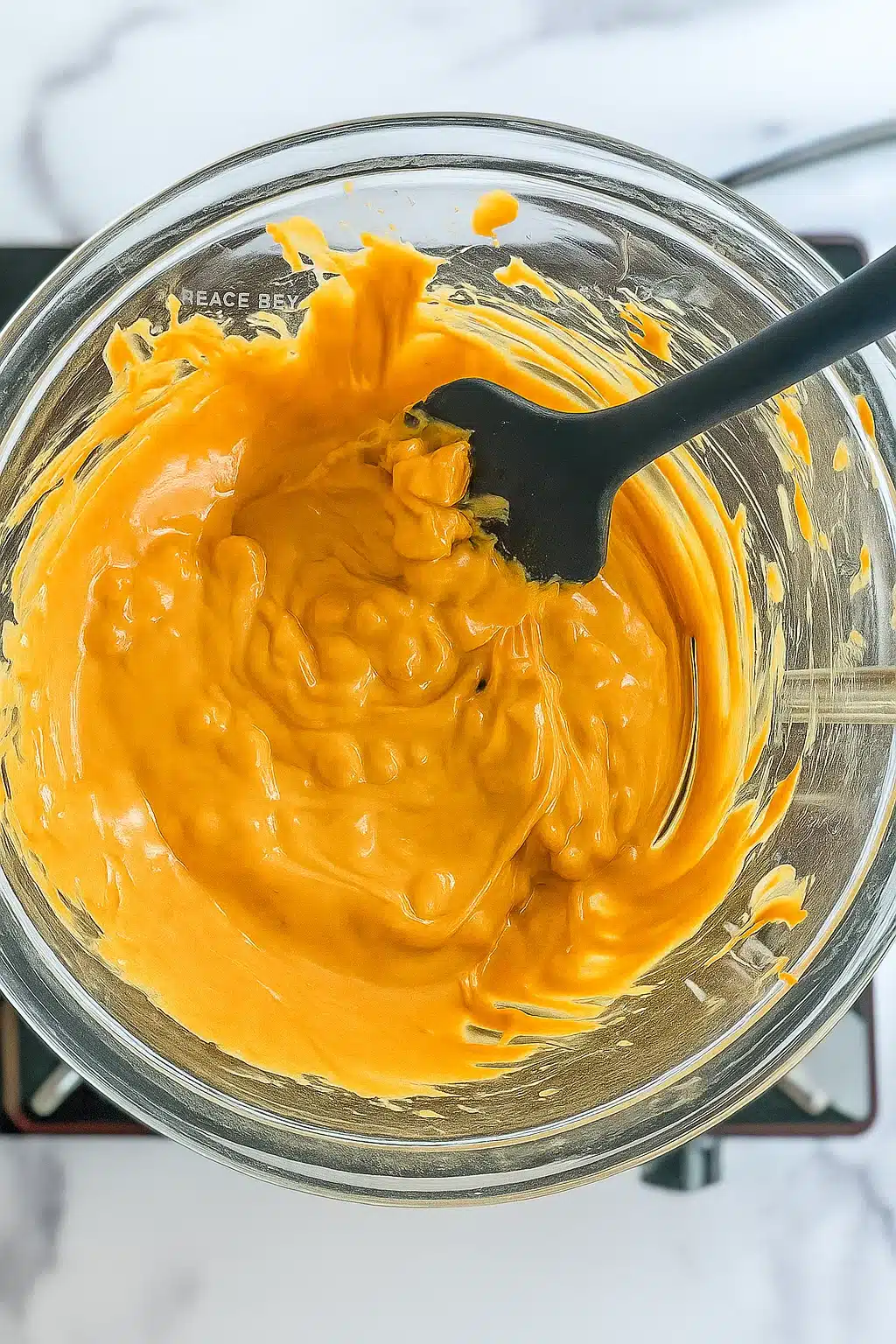 melting-peanut-butter-butterscotch-no-bake-cornflake-cookies Melting Peanut Butter and Butterscotch Mixture for No Bake Cornflake Cookies