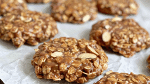 no bake cookies with maple syrup, oats, and peanut butter on parchment paper