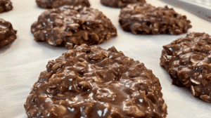 Original Chocolate Oatmeal No Bake Cookies on parchment paper made with peanut butter, oats, and cocoa