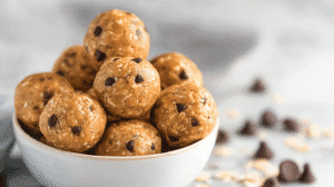 High-protein energy balls with oats and chocolate chips in a bowl