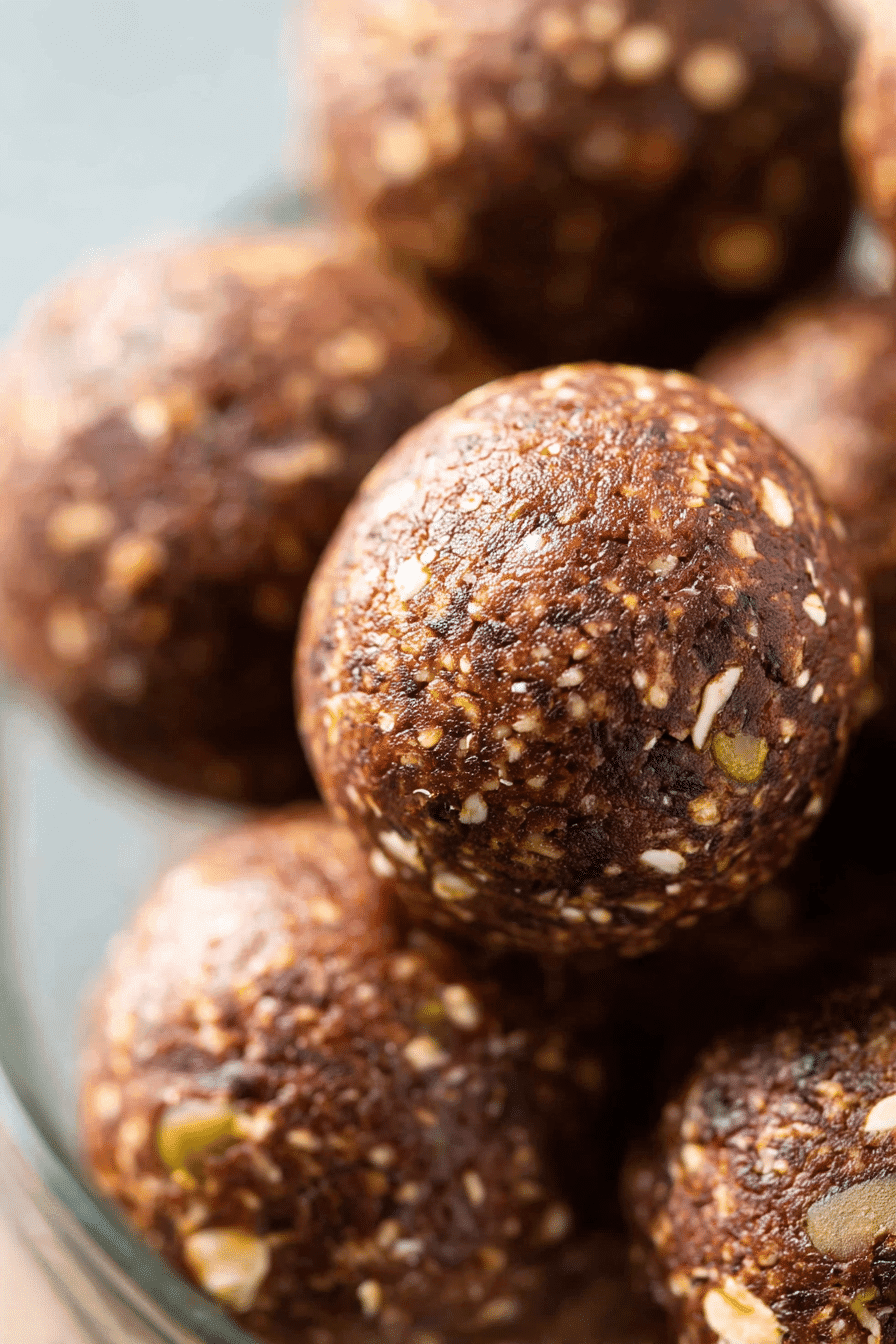 Nut-free chocolate energy bites with oats and seeds in close-up view