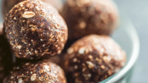 Nut-free energy bites with oats and seeds in close-up view