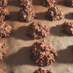 Peanut-free no bake cookies for school made with chocolate and oats on parchment paper