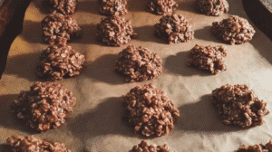Peanut-free no bake cookies for school made with chocolate and oats on parchment paper