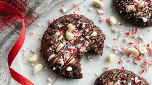 No bake candy cane crunch cookie topped with chocolate drizzle and crushed peppermint.