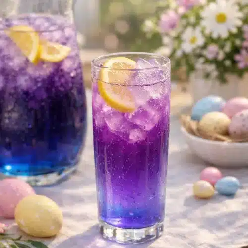 Butterfly Pea Flower Easter Drink – Color-Changing Spring Lemonade 1 Layered butterfly pea flower Easter drink with purple gradient